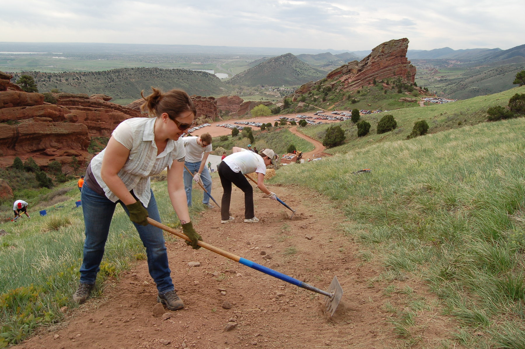 volunteers improve a trail at red rocks. photo