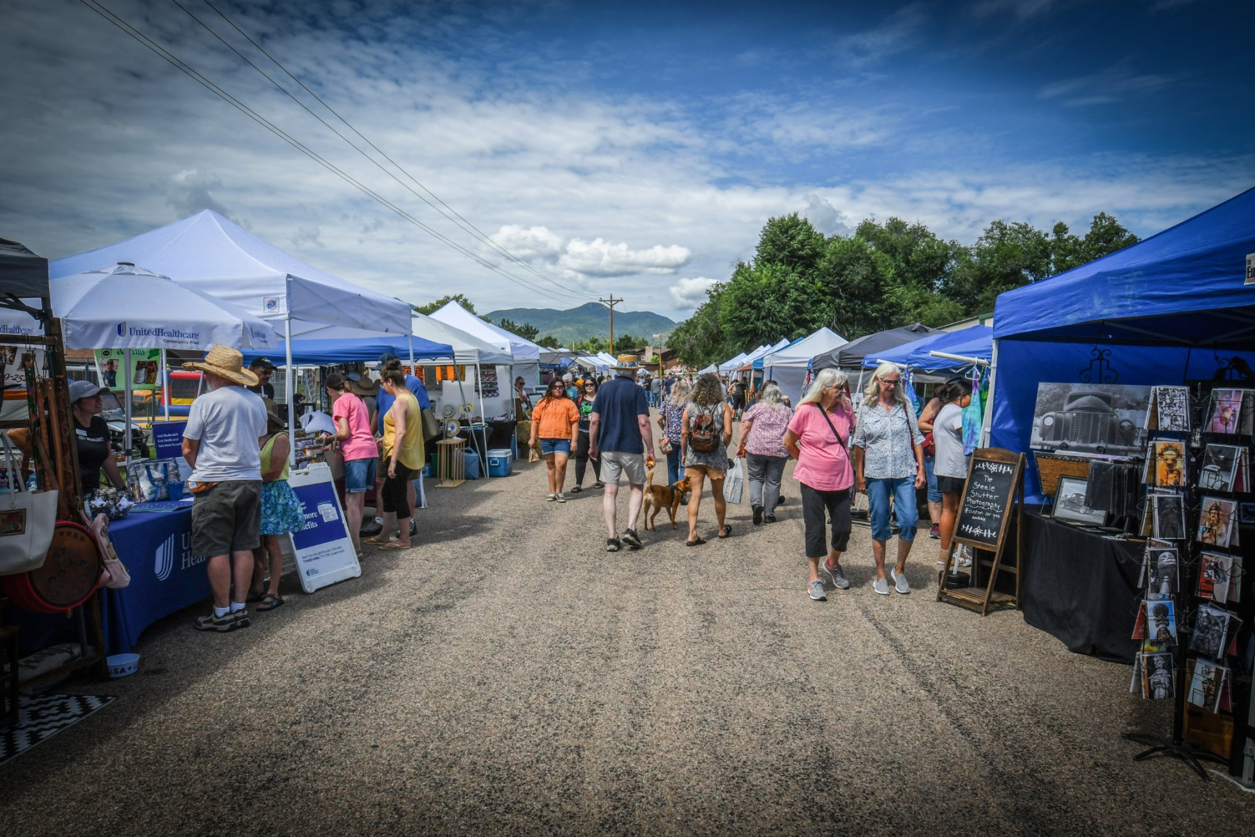 crowds browsing vendor booths in the beulah arts and crafts festival in beautiful beulah, colorado photo