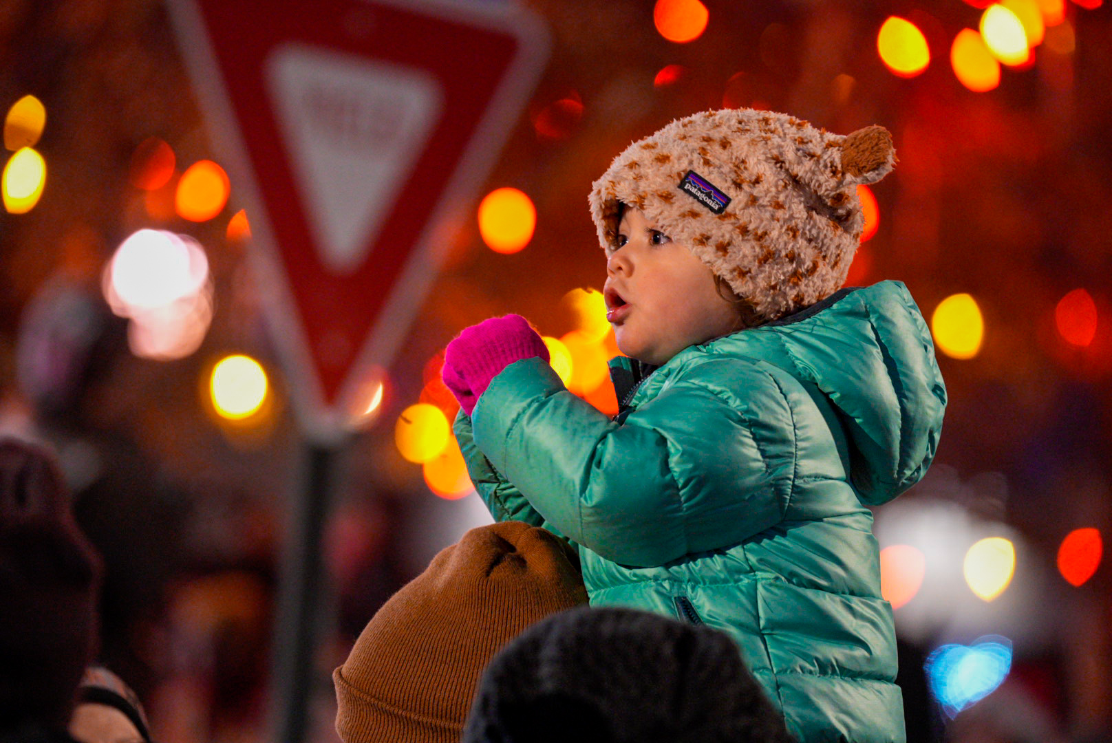 a child enjoying the parade of lights. photo by devon balet photo 6
