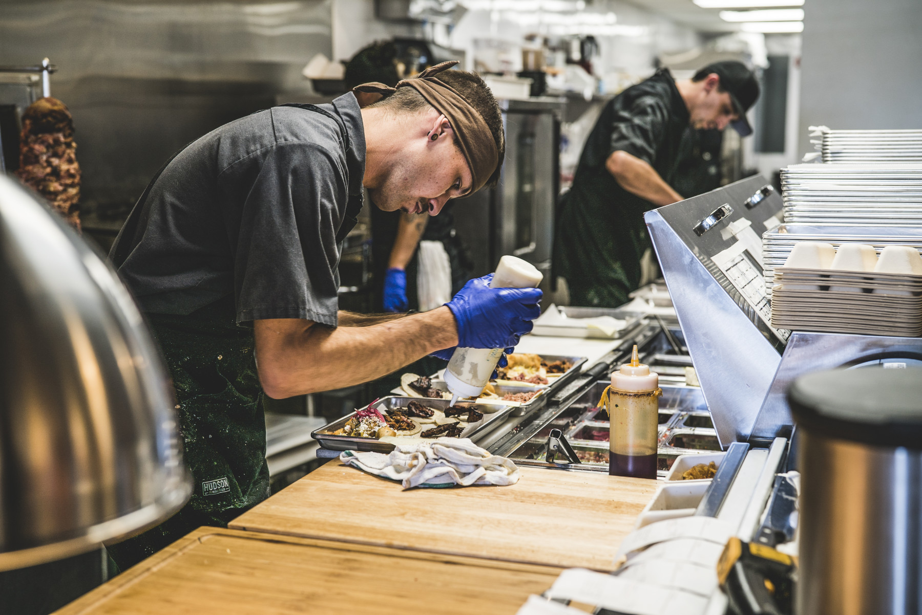 a chef prepping food. photo by devon balet photo 3