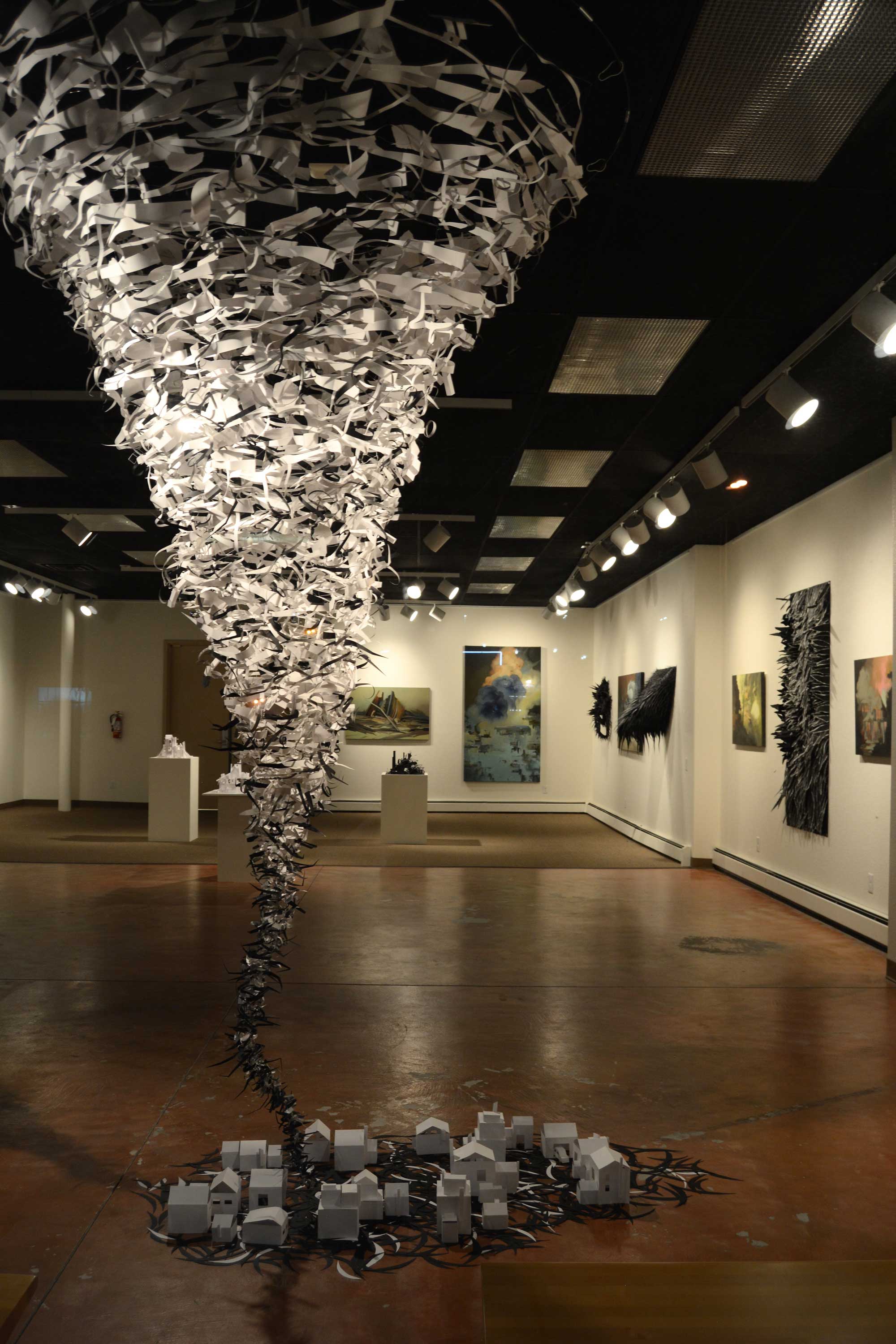 disputed territory, november 2-30, 2018. an exhibition featuring paintings and three-dimensional paper works by lenka konopasek. konopasek is a salt lake city-based artist whose work explores the theme of natural and man-made disasters. photo