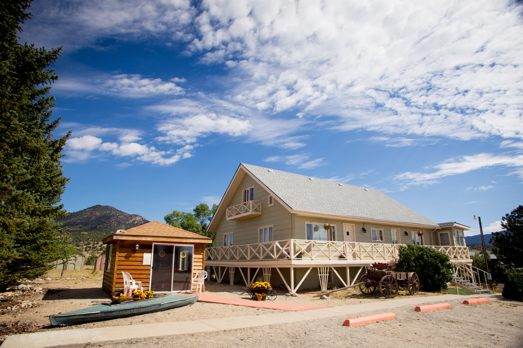 a view of the riverhouse lodge on a beautiful summer day. photo