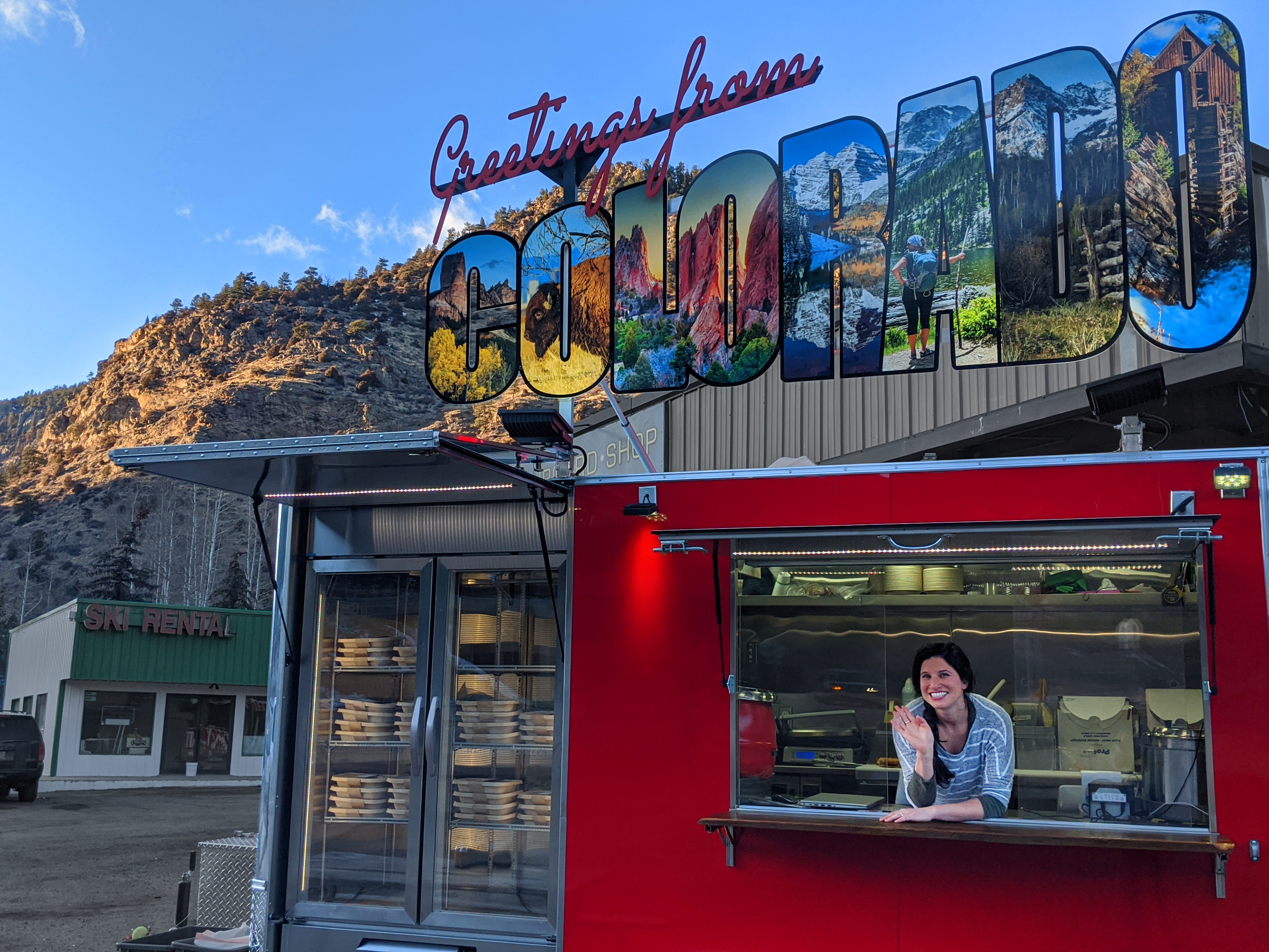come take a picture with our postcard-shaped trailer! photo