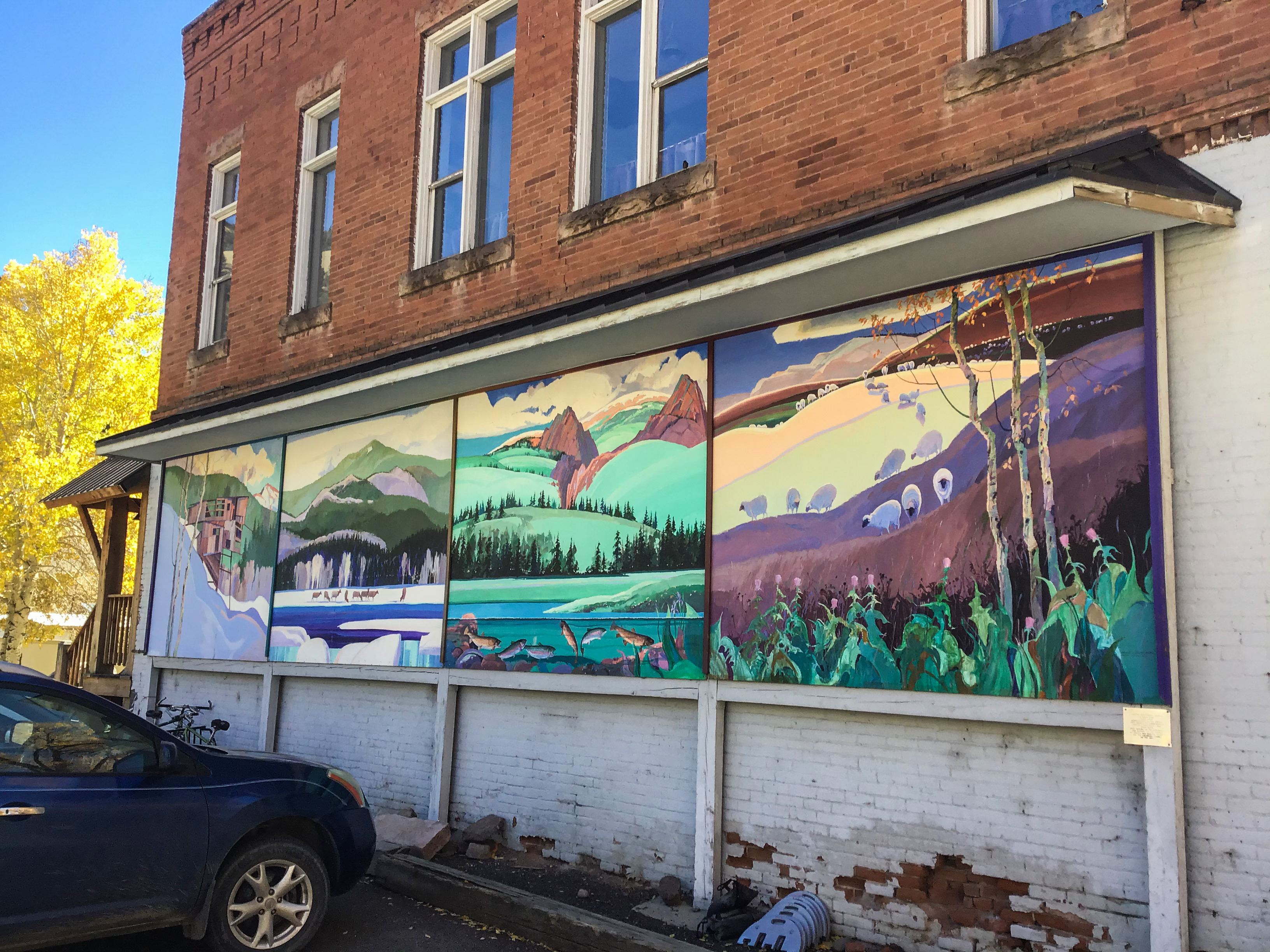 ​the four seasons mural in creede by stephen quiller photo