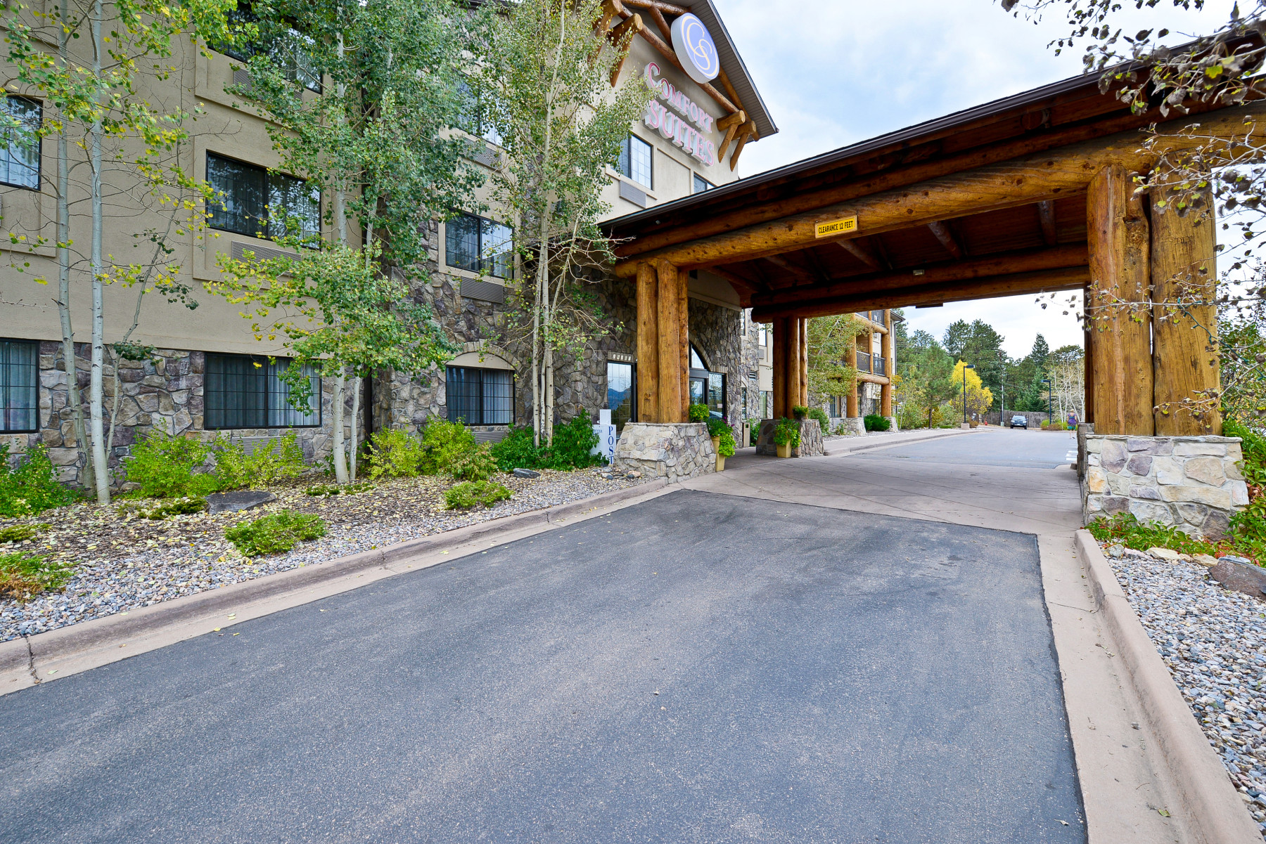 log and stone structure photo