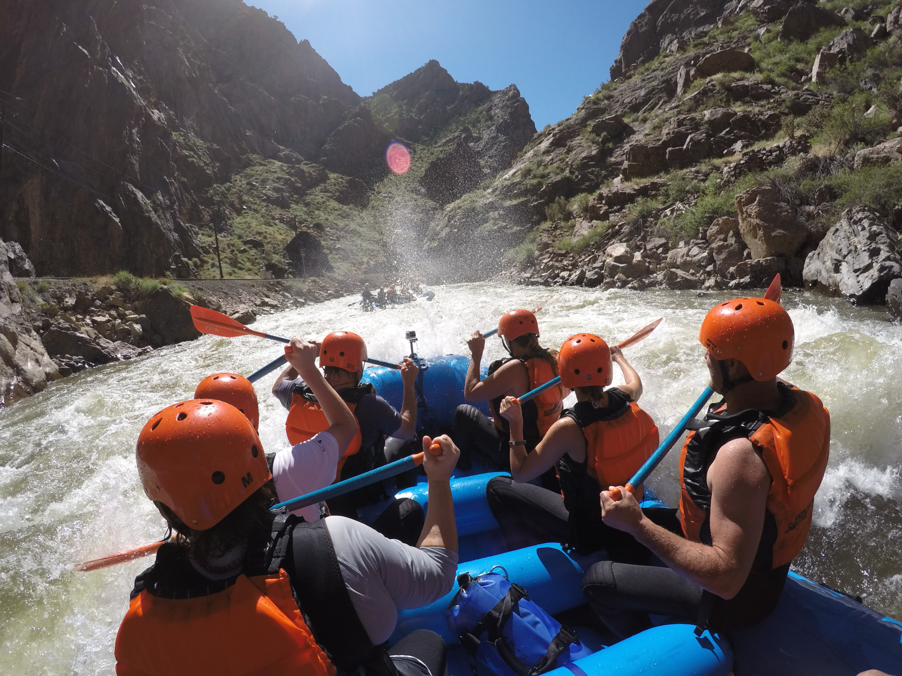 a crew of echo canyon rafters paddle through sunshine rapid in the royal gorge photo 6