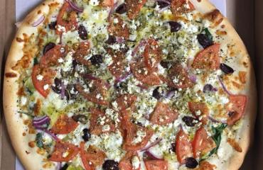 Greek pizza Photo