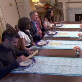 Colorado Top Chef Episode 10 Top Chef judges at a dining table with plates in front of them