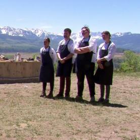Colorado Top Chef Episode 12 Colorado Top Chef finalists stand in black aprons with the San Juan mountains in the background
