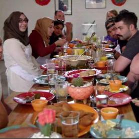 Colorado Top Chef Episode 4 People dining at a packed and festive dinner table