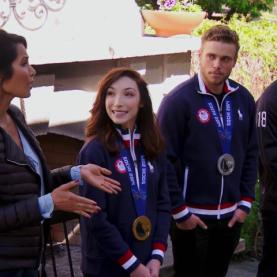 Colorado Top Chef Episode 7 Padma Lakshmi talking to Top Chef contestants wearing Olympic-style medals