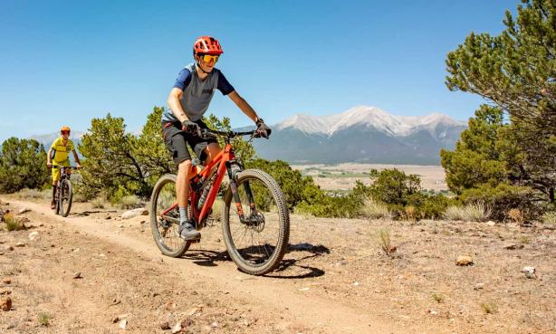 Two teens mountain biking near Buena Vista and Salida