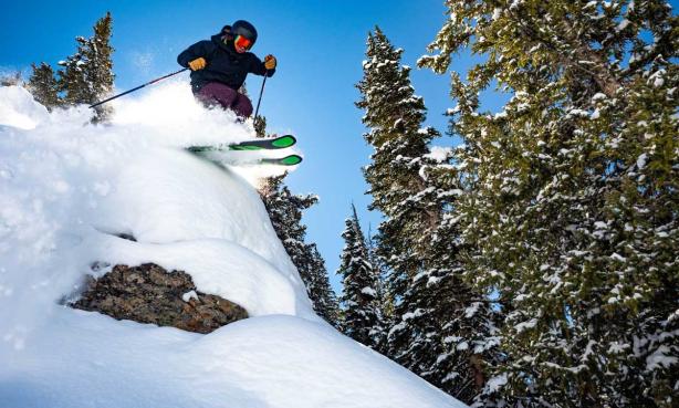 Skier gliding through powder