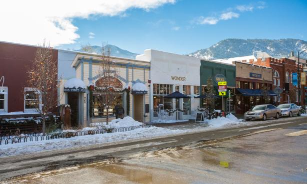Snow-sprinkled shops on Boulder Colorado's Pearl Street