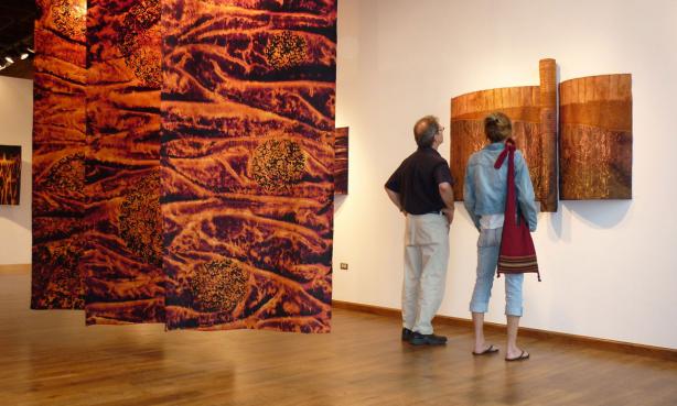 patrons looking at artwork as part of RINO Art District art walk