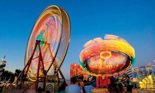 ferris wheels and rides at the colorado state fair in Pueblo, CO