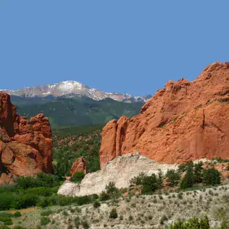 view of garden of the gods and pikes peak off visitor & nature center terrace photo