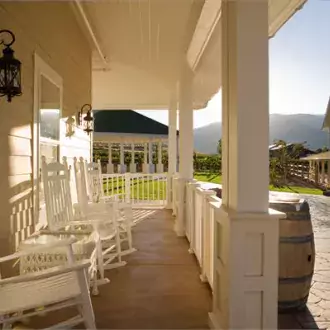 rock your cares away on our comfortable wraparound porches. photo