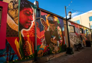 Mural with faces of people on it