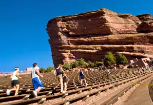 Runners take the stairs at Red Rocks Park & Amphitheatre in Morrison