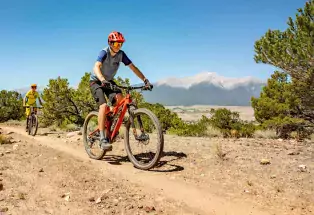 Two teens mountain biking near Buena Vista and Salida