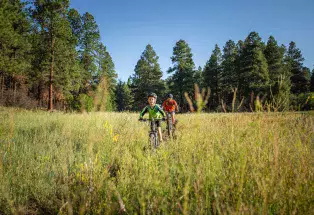 Two mountain bikers on Boggy Draw trail in Dolores