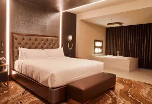 The bed in the Terrace Suite at Monarch Casino Resort