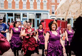 Revelers in costume enjoy Madam Lou Bunch Day in Central City