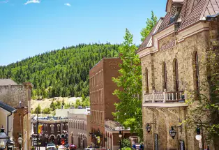 Summer photo of the stone Central City Opera.