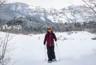 Person snowshoeing on trails outside of Crested Butte