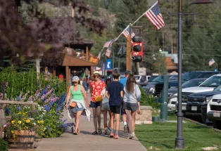 People strolling on the historical boardwalk in Grand Lake, Colorado