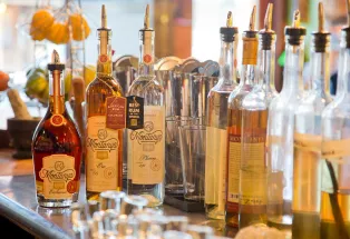Bottles of spirits line the counter at Montanya Distillers in Crested Butte