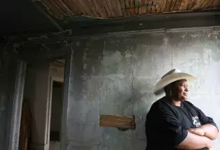 Former head of the Black American West Museum LaWanna Larson in O.T. Jackson's Dearfield home