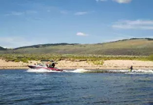A boat gets ready to pull a water skier at Wolford Mountain Reservoir in Kremmling