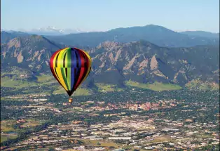 Indulge in a hot-air balloon ride for spectacular Rocky Mountain views.