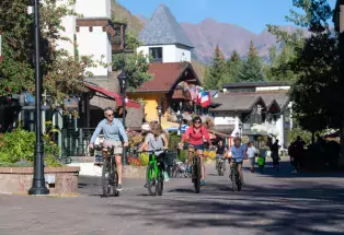 Family Biking through Downtown Vail