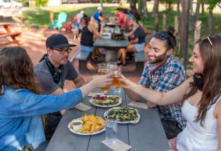 Diners enjoy craft beer at Sanitas Brewing