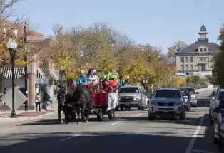 A fall wagon ride down Main Street in downtown Littleton