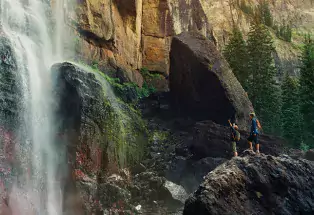 people in front of bridal veil falls