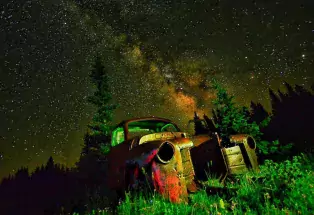 dilapidated truck in front of the Night skies near Cuchara