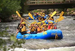 Rafters Floating Down Clear Creek in Idaho Springs