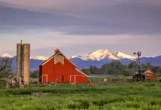 Barn and mountain views form the Agricultural Heritage Center in Longmont