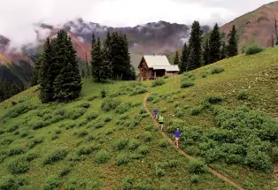 Hike, run, snowshoe or ski to the eco-friendly OPUS Hut outside Silverton.