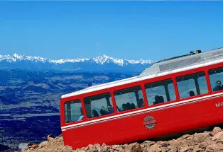 The Pikes Peak train summiting America's Mountain