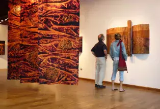 patrons looking at artwork as part of RINO Art District art walk