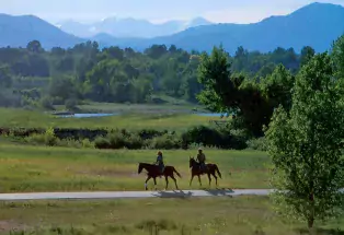 Riding horses along the South Platte River in South Platte Park