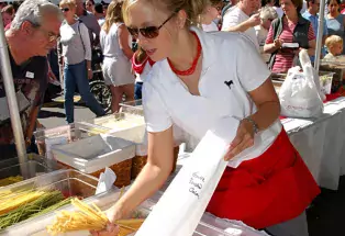 woman selling pasta at Festival Italiano in Belmar in Lakewood, CO