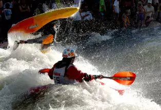 kayakers flipping in the whitewater kayaking contest at the FIBark festival in Salida, Colorado