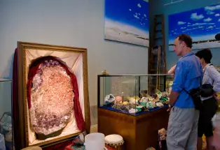 patrons admiring gemstones and rocks at art gallery in Salida, Colorado
