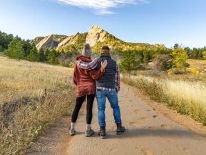 The Flatirons are one of Boulder’s top attractions A couple views the Flatirons from a trail